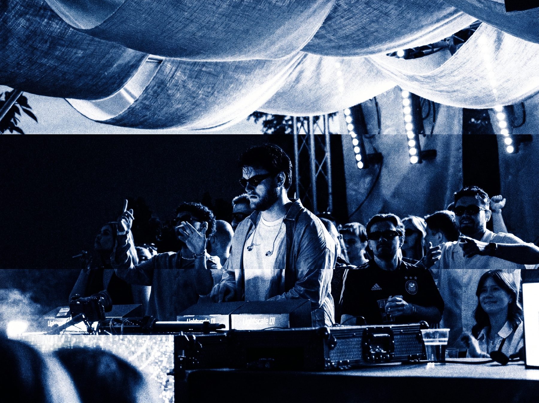 CH4YN, behind the decks with the crowd